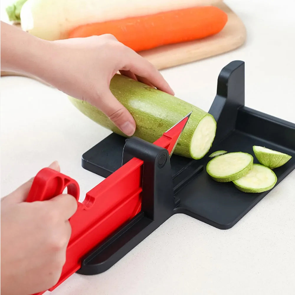 Green vegetable cutter with stainless steel blades for slicing carrots and potatoes