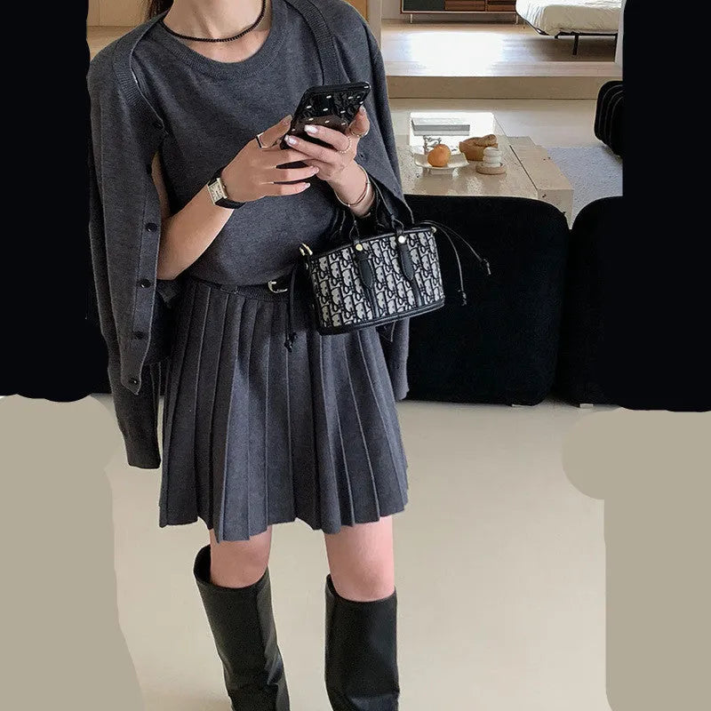 Women's national style knitted two-piece with vest skirt and cardigan featuring 3D pattern texture and adjustable belt