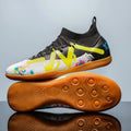 Men's low-top football boots with replaceable screw-in studs, in black and yellow colourway
