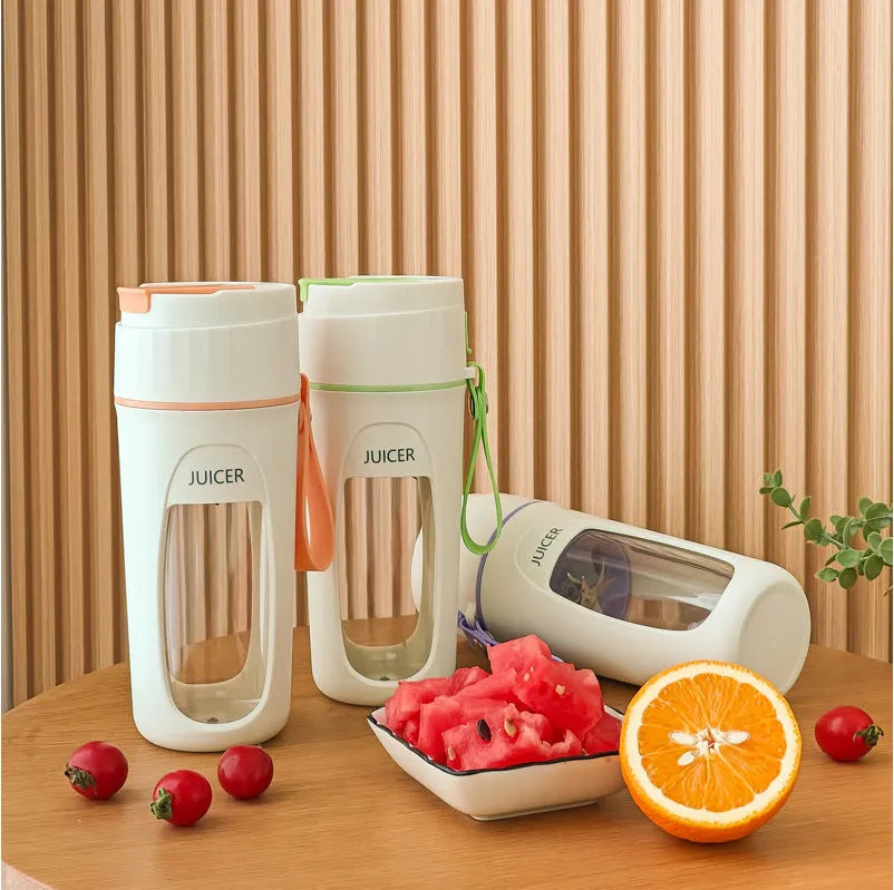 Portable USB charging electric blender cup in grass green, light purple, and fresh orange colours.