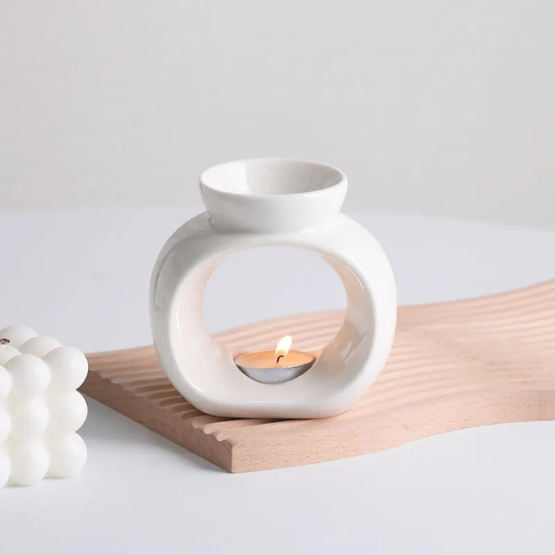 White ceramic aromatherapy stove ornament with Nordic design and anti-dry burning safety feature