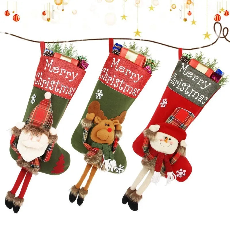 Three large Christmas stockings with Santa, Snowman, and Reindeer 3D applique designs in non-woven fabric