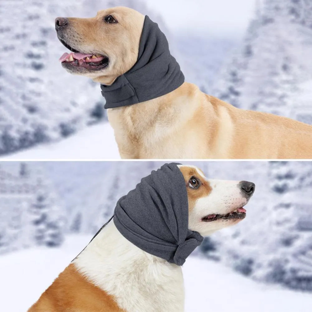 Dog wearing purple calming hoodie with ear muffs covering head and neck