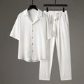 Men's Chinese style two-piece sports set with short sleeve shirt and trousers in polyester fabric
