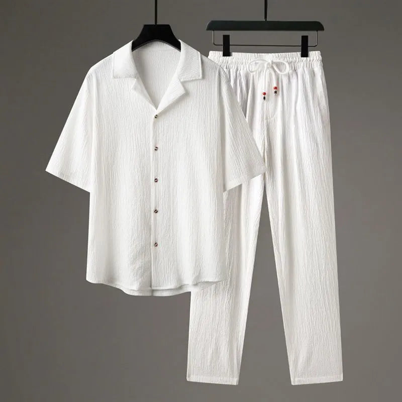 Men's Chinese style two-piece sports set with short sleeve shirt and trousers in polyester fabric