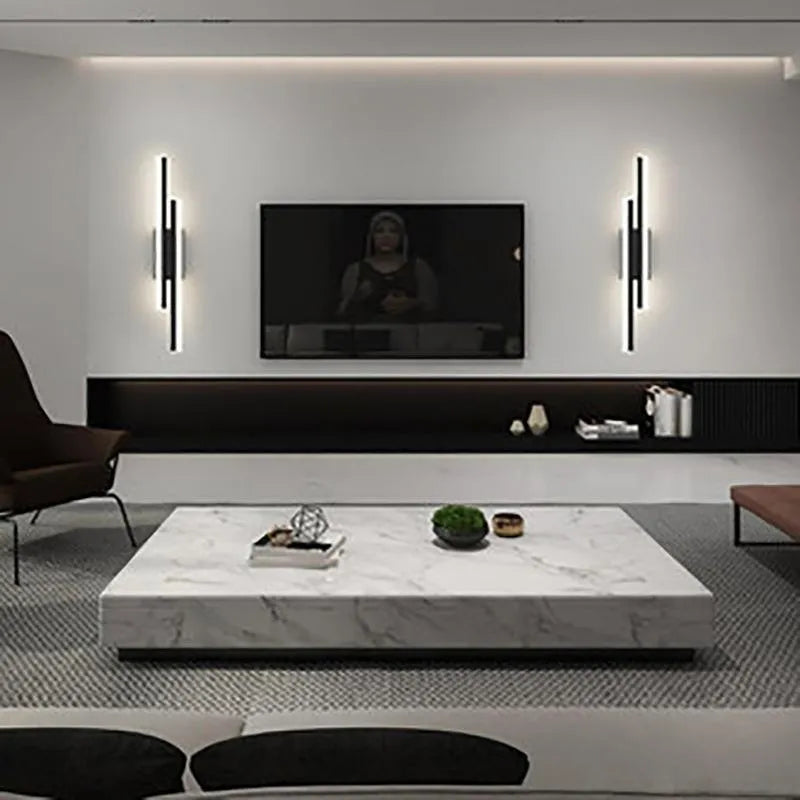 Scandinavian minimalist LED wall light with 500mm acrylic lampshade in black finish mounted on white wall