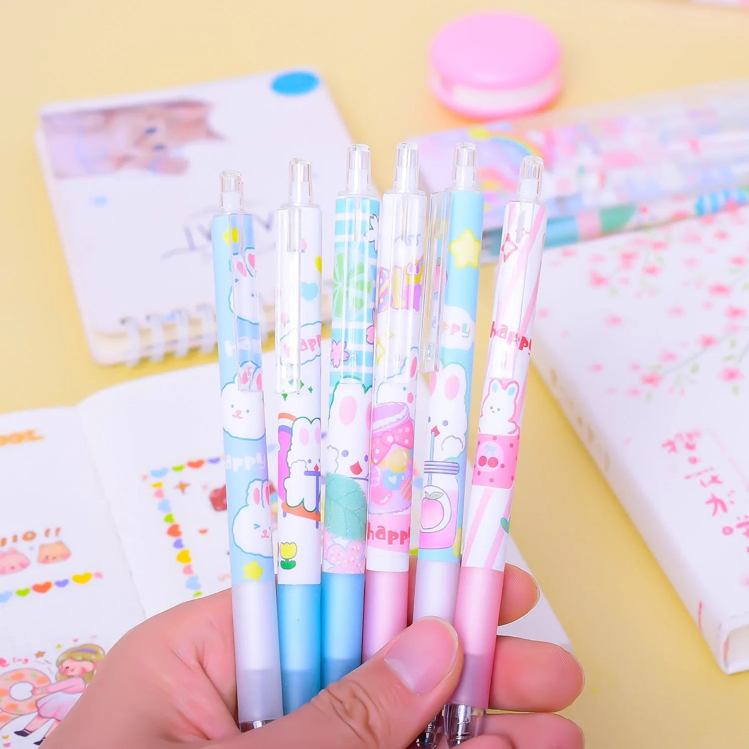 Six black ink signature pens with 0.5mm tips and cartoon bunny designs