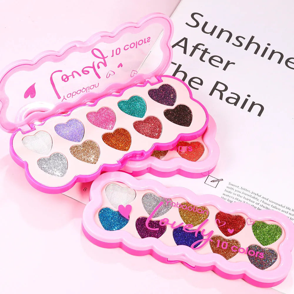 Pearlescent heart-shaped eye shadow palette with ten colours including sequins for punk and festival make-up.