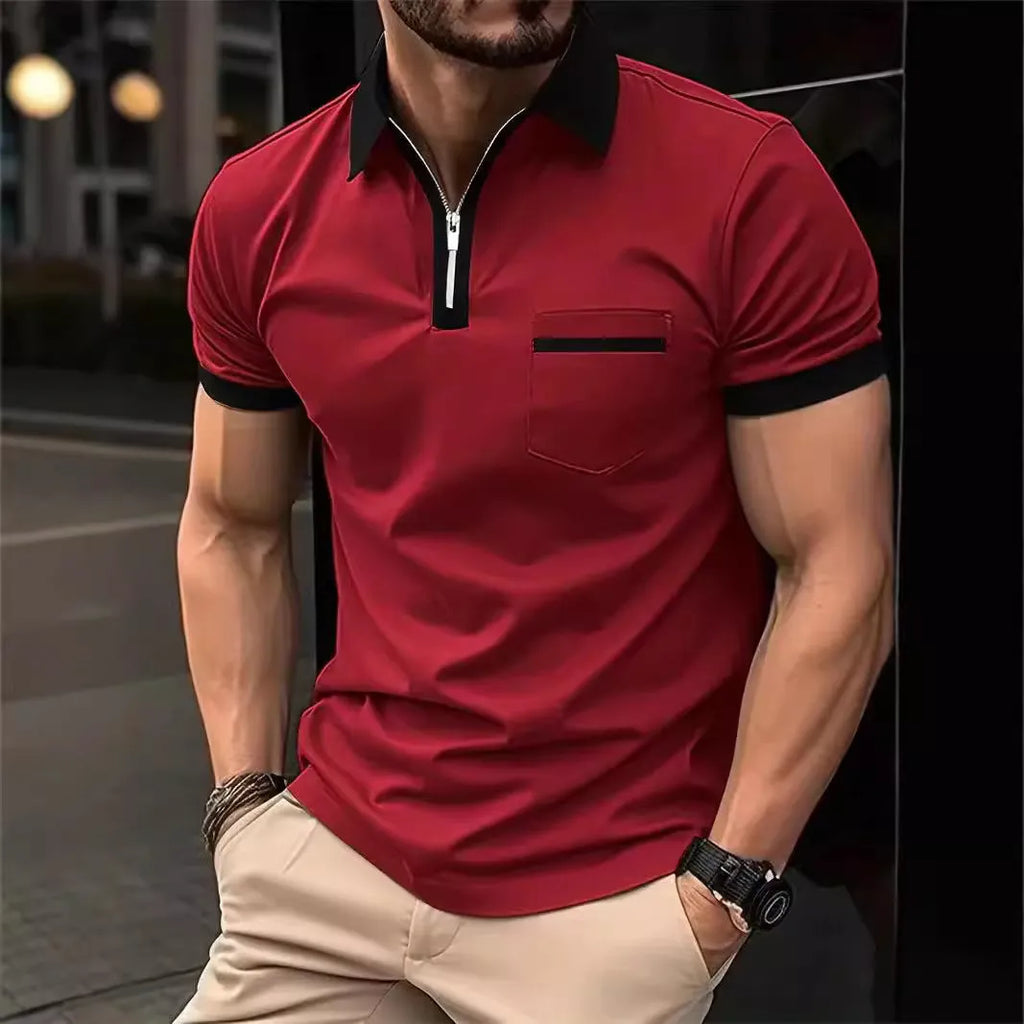 Man wearing a loose-fit short-sleeve casual shirt with a chest pocket and zipper decorations on the front.