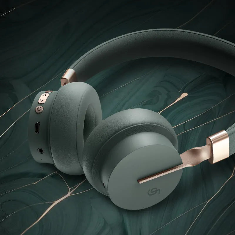 Solid colour Bluetooth headset worn on head with 10-metre wireless range for calls and music