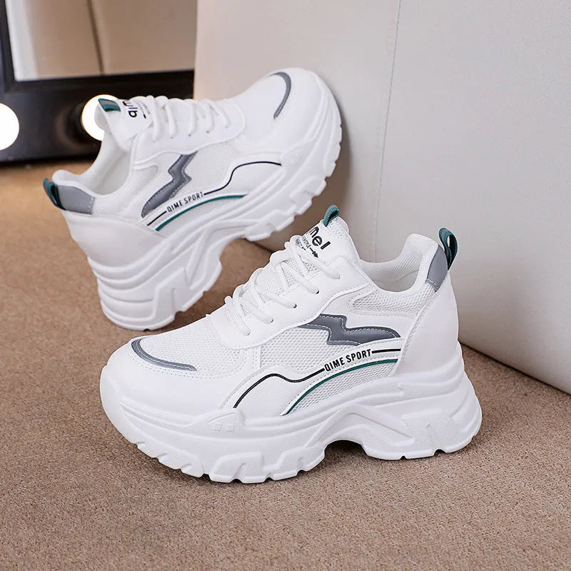 Women's low-top dad shoes in beige with cross shoulder straps, rubber sole, and breathable mesh upper