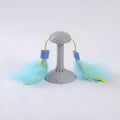 Blue plastic suction cup cat toy wand with double-haired prick head and grinding teeth section