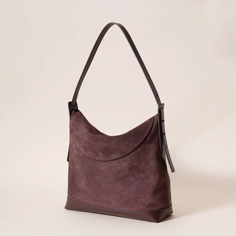 Genuine leather women's shoulder bag in retro style with clamshell design and internal organisers