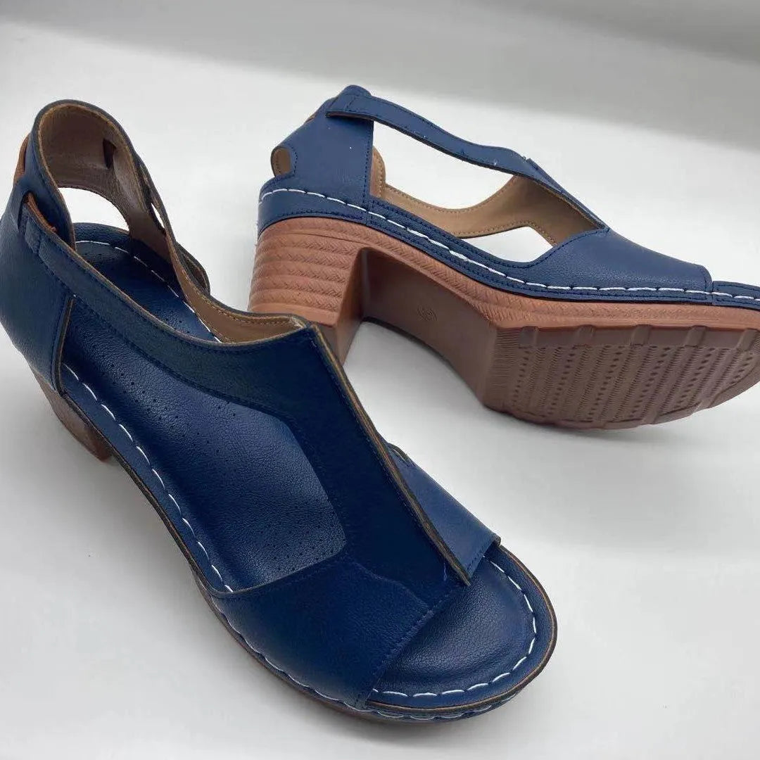 Women's plus size peep toe wedge sandals with a buckle strap in a light brown colour.