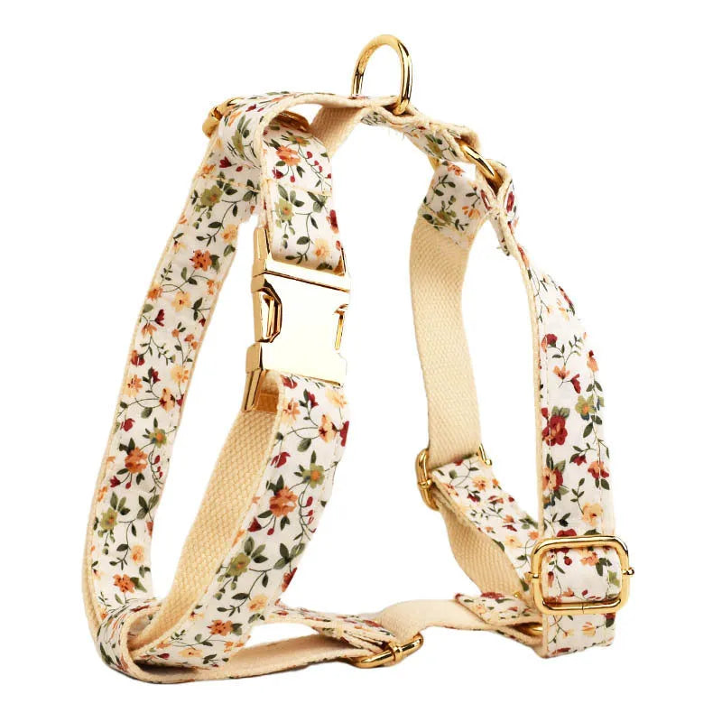 Cloth dog collar set with white flower bow and matching leash and vest accessories