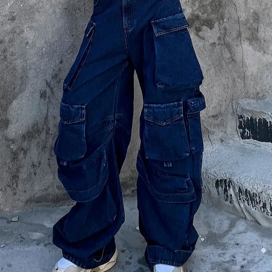Dark blue distressed wide-leg women's jeans with a high waist and multiple pockets on a mannequin.