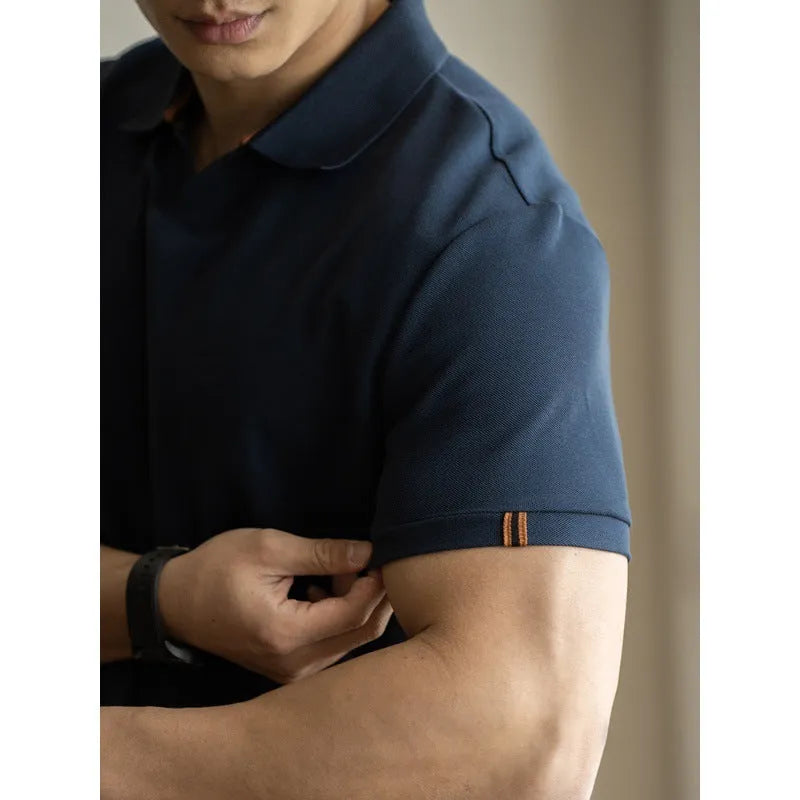 Men's blue short sleeve cotton polo shirt on a hanger, regular fit.