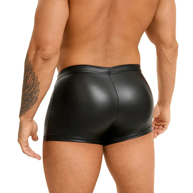 Black PU leather men's boxer shorts with U pouch design on a size chart background