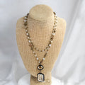 Two-layer tribal necklace with a stone and glass pendant on an alloy chain.
