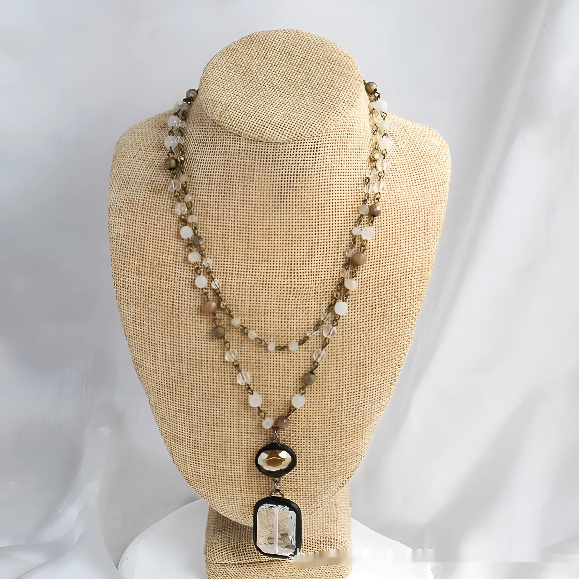 Two-layer tribal necklace with a stone and glass pendant on an alloy chain.