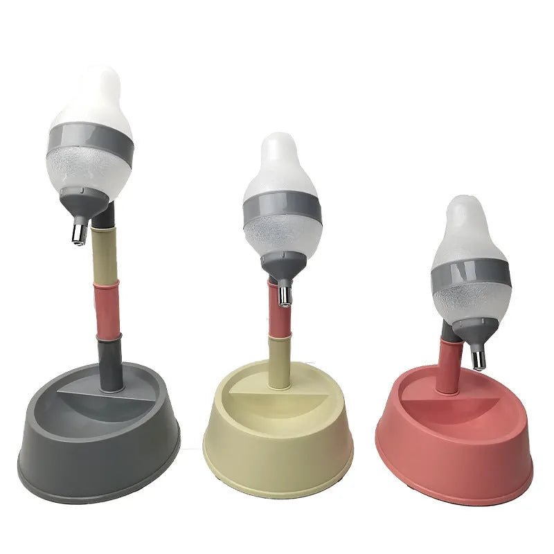 Green adjustable pet water dispenser showing detachable pole, bowl with water-weight holder, and steel ball-tip nozzle