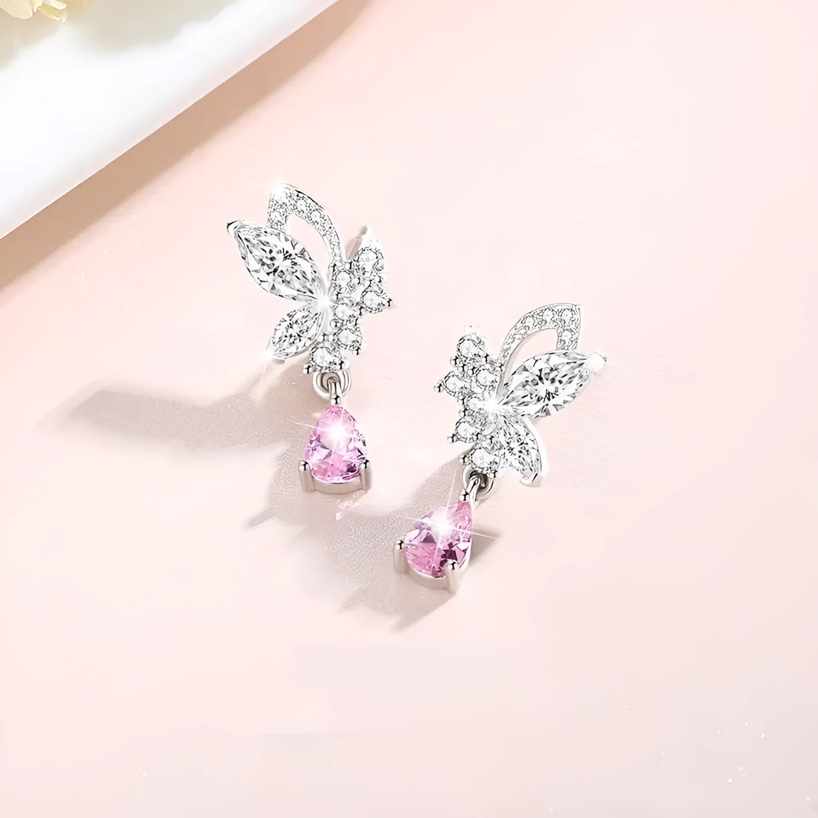 Butterfly design silver stud earrings with crystal accents on 925 silver backing for women