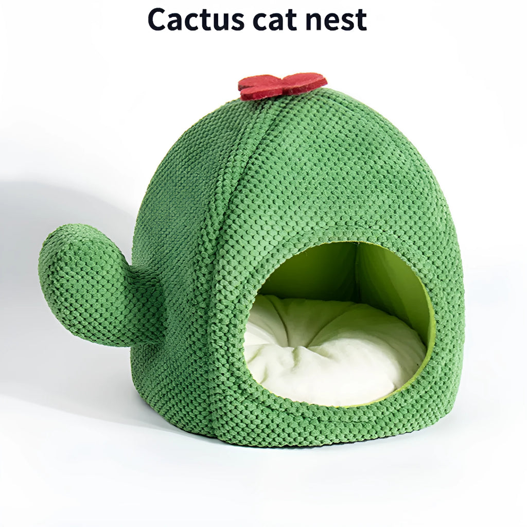 Green cactus-shaped enclosed cat bed with soft fluffy fabric and a plush interior for pets.