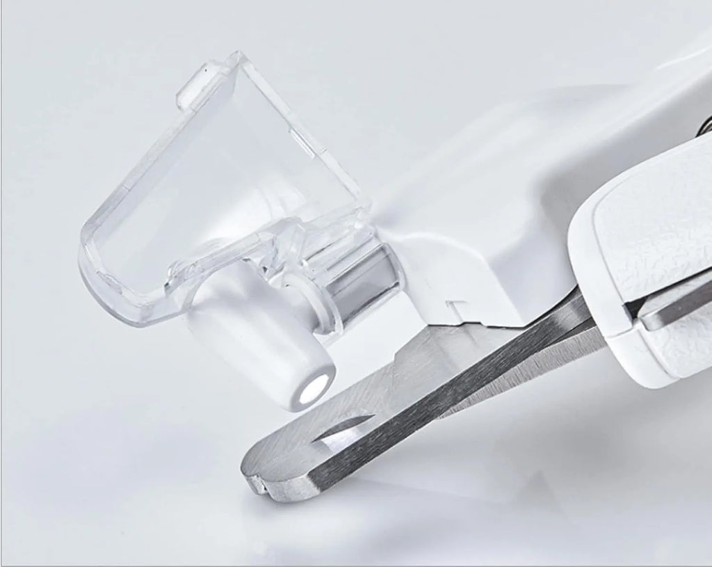 White LED pet nail clippers with transparent baffle and file, 14.8cm long