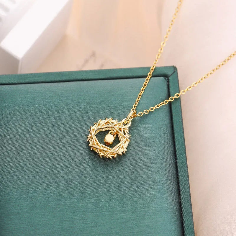 Gold circle net design necklace for women with titanium steel O chain and geometric electroplated pendant.