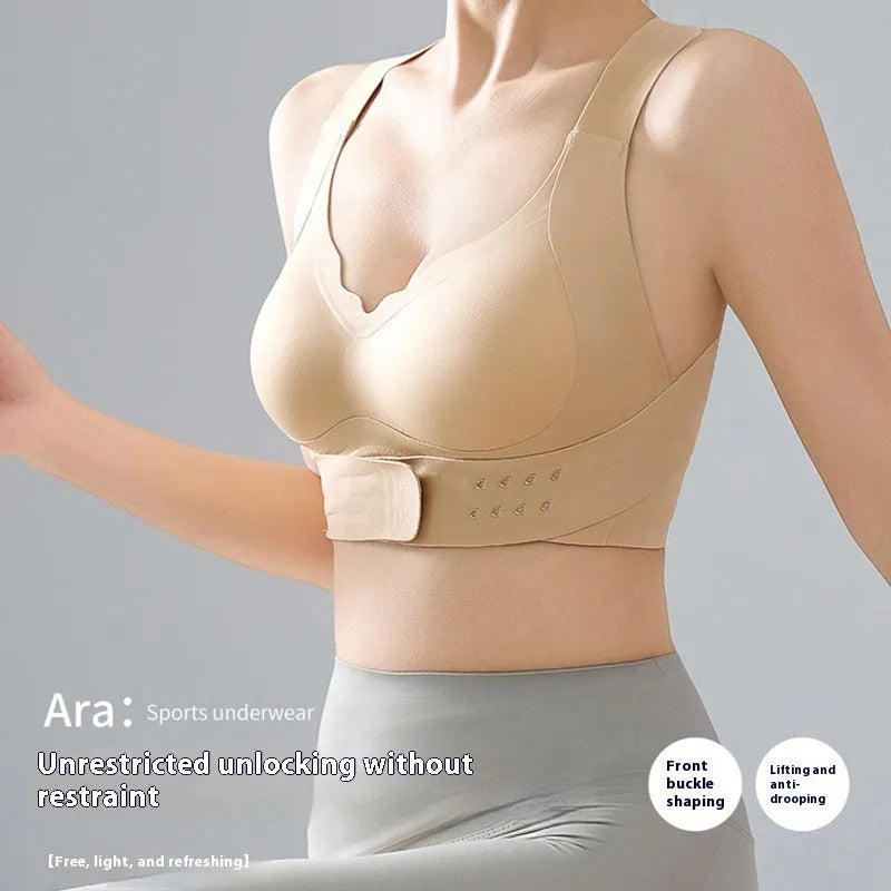 Female cross exercise yoga bra with front buckle, back shaping, and 3/4 cup design in Dynamic Black colour