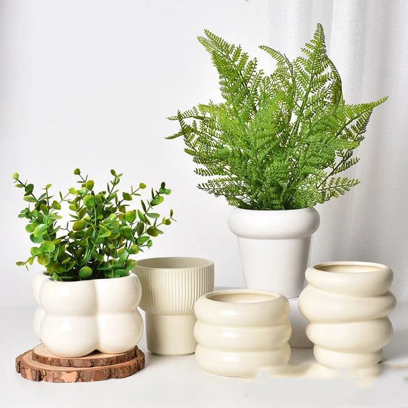 Roman column matte yellow ceramic flower pot with breathable material for plant cultivation