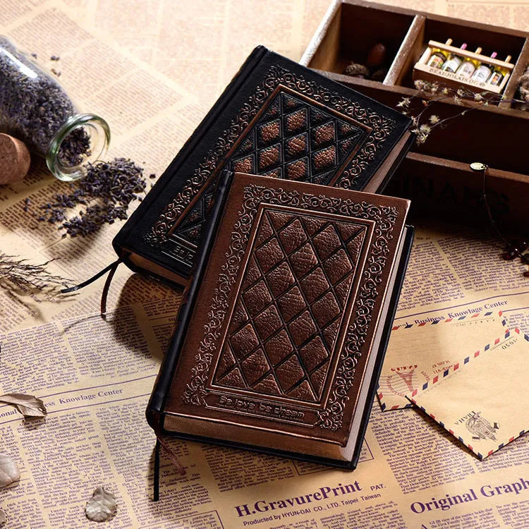 Embossed faux leather notepad with three-dimensional cover design in bronze colour showing 200-page thickness