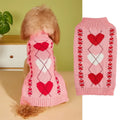 Red love heart dog sweater with bow decoration on a small breed pet, showing acrylic knit and fit