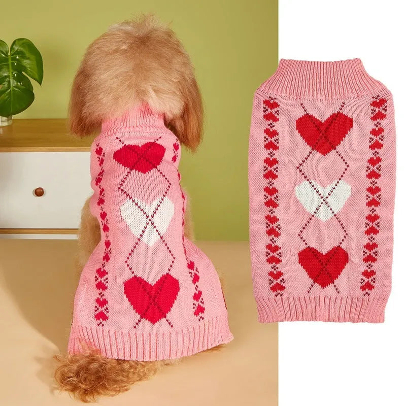 Red love heart dog sweater with bow decoration on a small breed pet, showing acrylic knit and fit