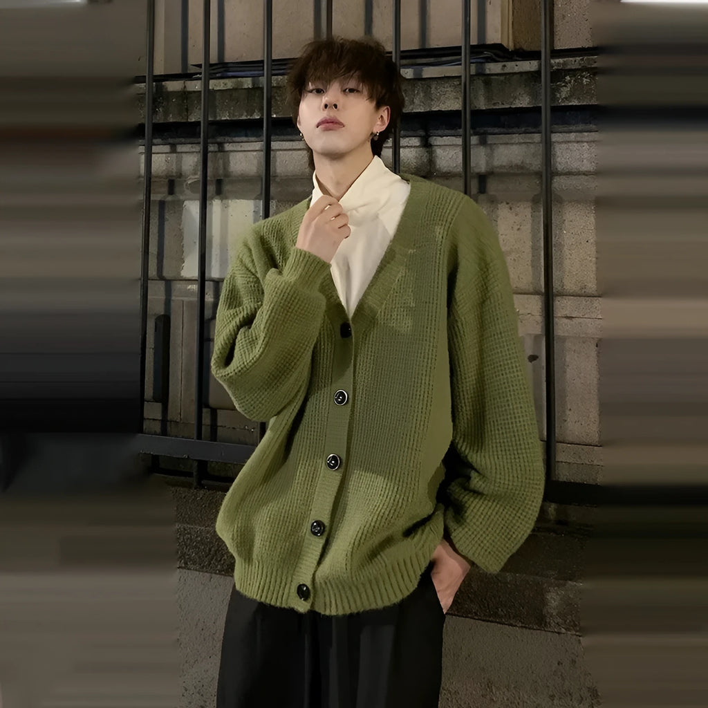 Men's loose-fit retro V-neck cardigan sweater in army green, shown on a hanger.