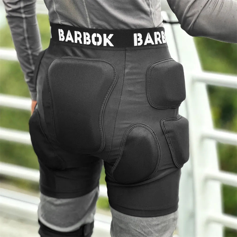 Black skating hip protection pants with integrated NBR foam pads for impact absorption during falls