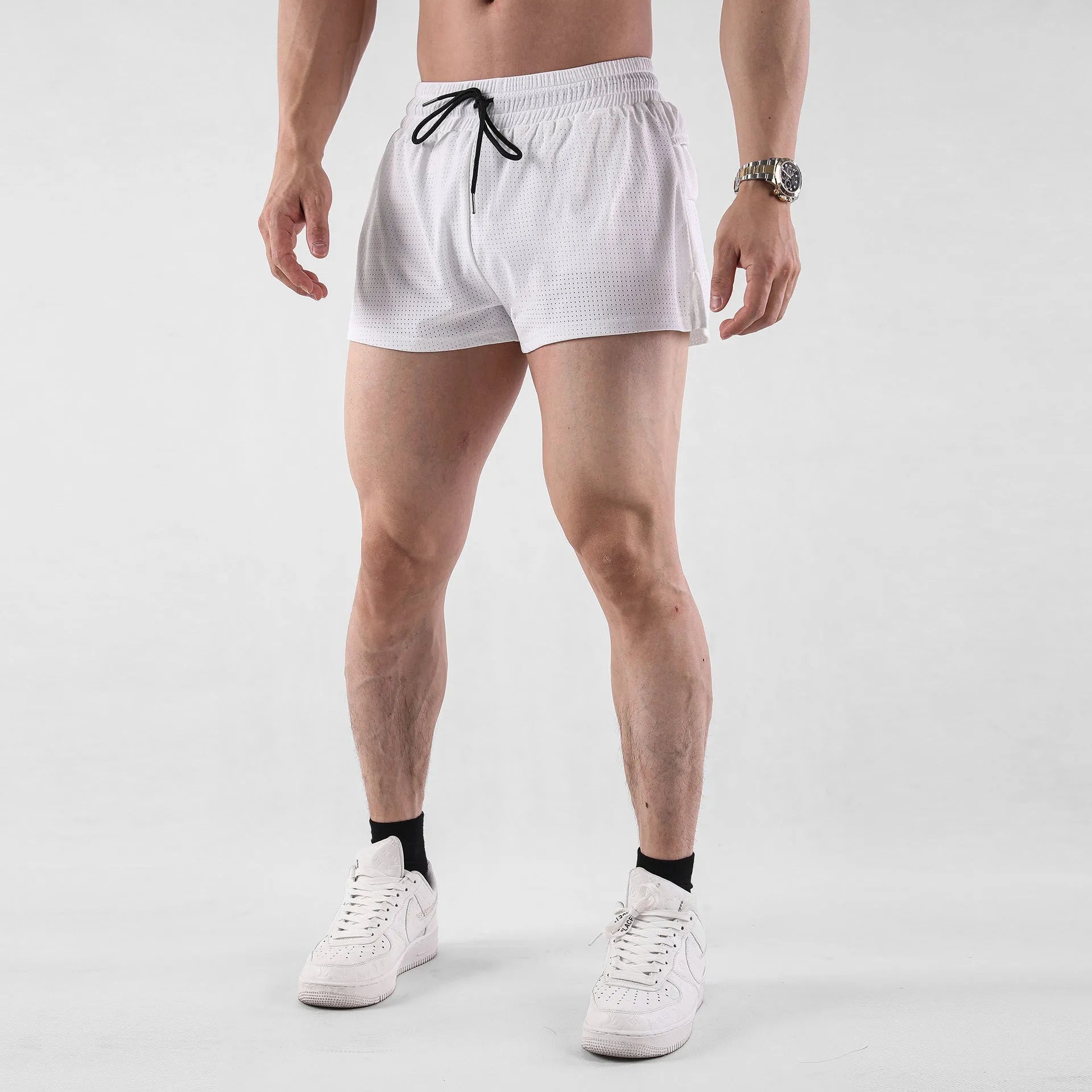 Men's black and white quick-drying nylon shorts with mid waist design for summer sports and leisure