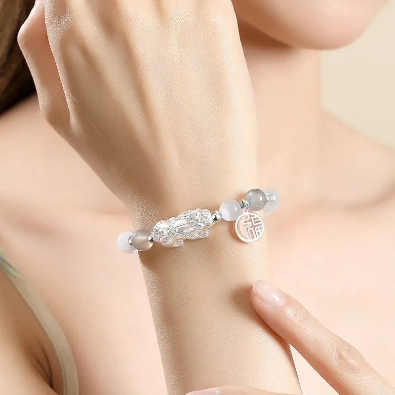Hand-woven sterling silver couple bracelet with animal tassel decorative elements