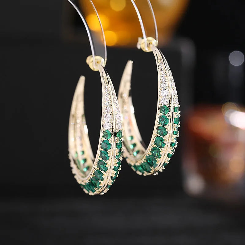 Women's geometric copper hoop earrings in electroplated colours measuring 4.3cm by 4.5cm