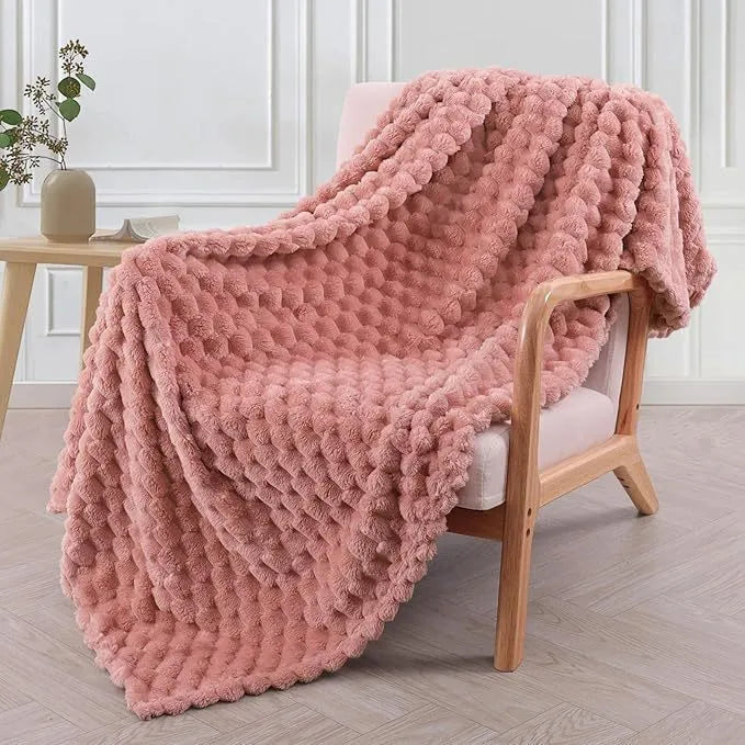 Children's plaid velvet blanket in camel colour, showing soft texture and size scale for cosy use.