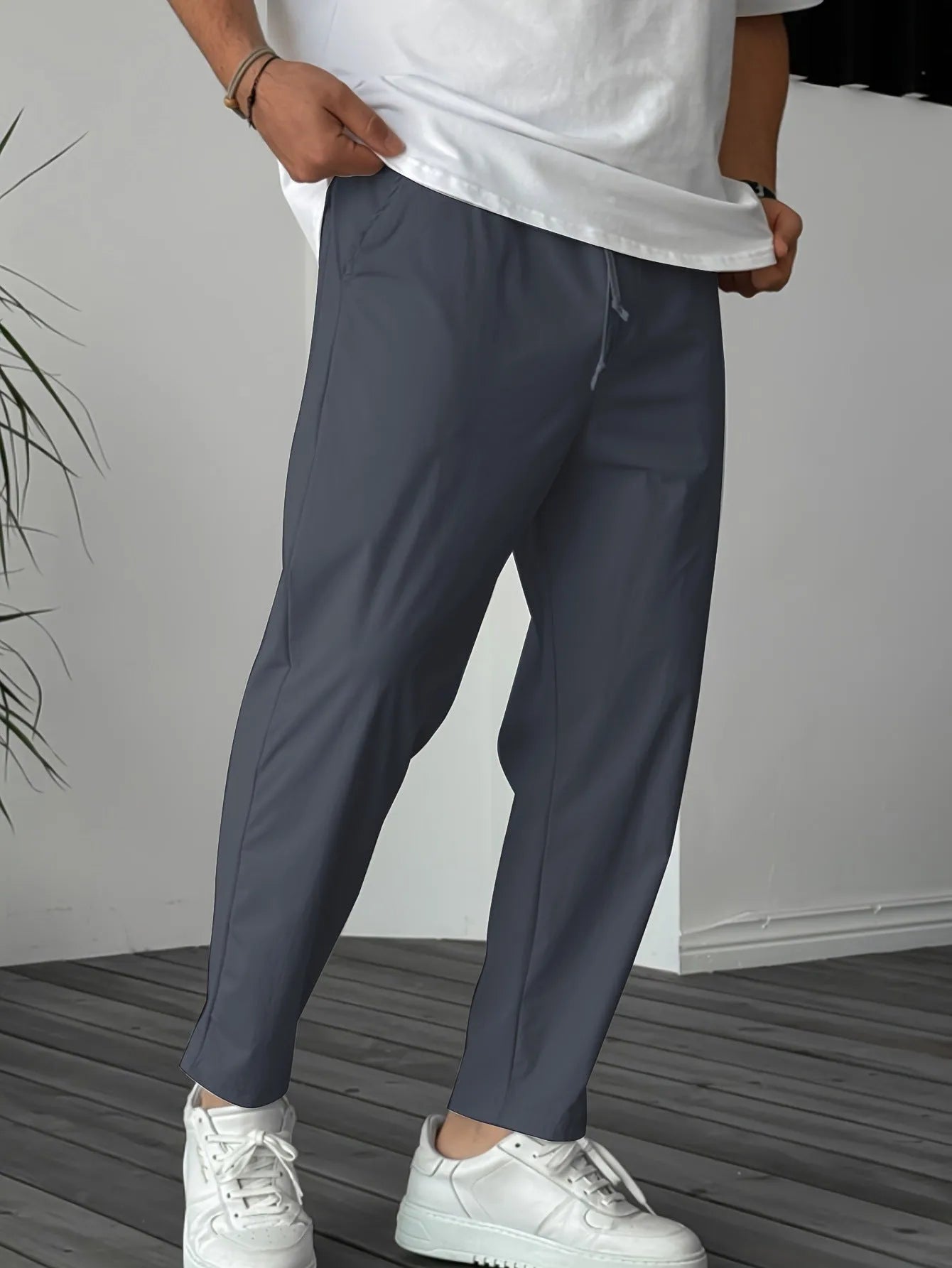 Men's straight-leg casual trousers with drawstring waistband and ribbon pocket detailing