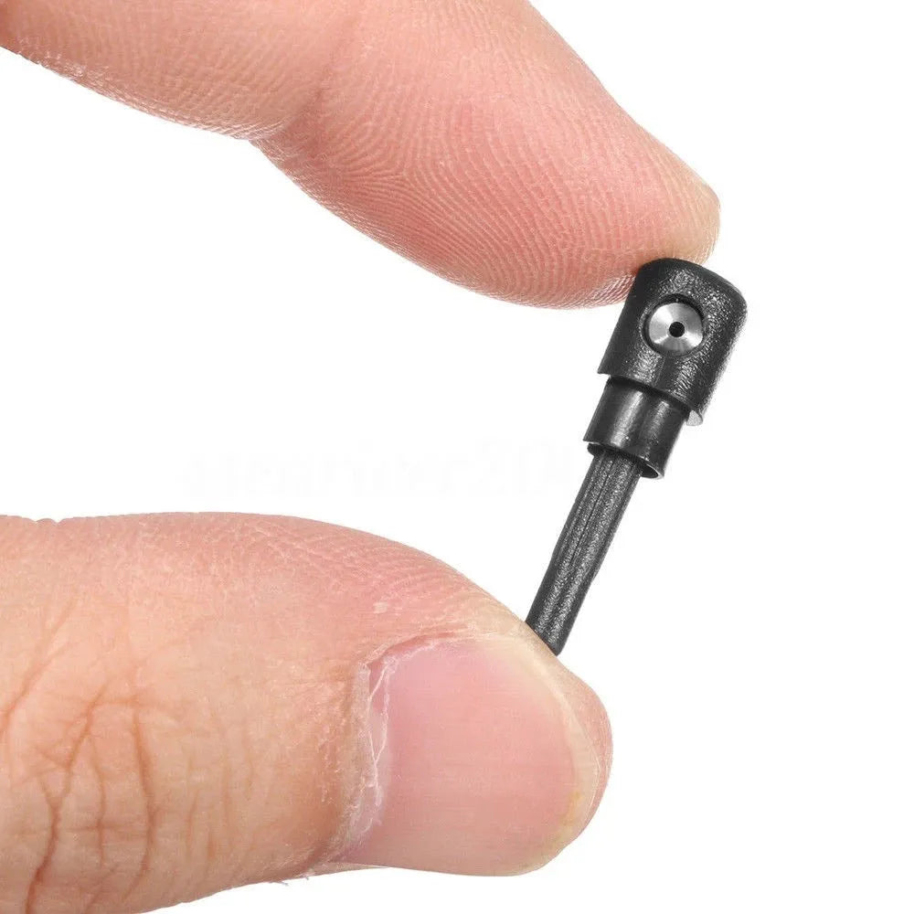 Black rear windshield washer nozzle replacement part for Volkswagen Golf and Audi Skoda cars.