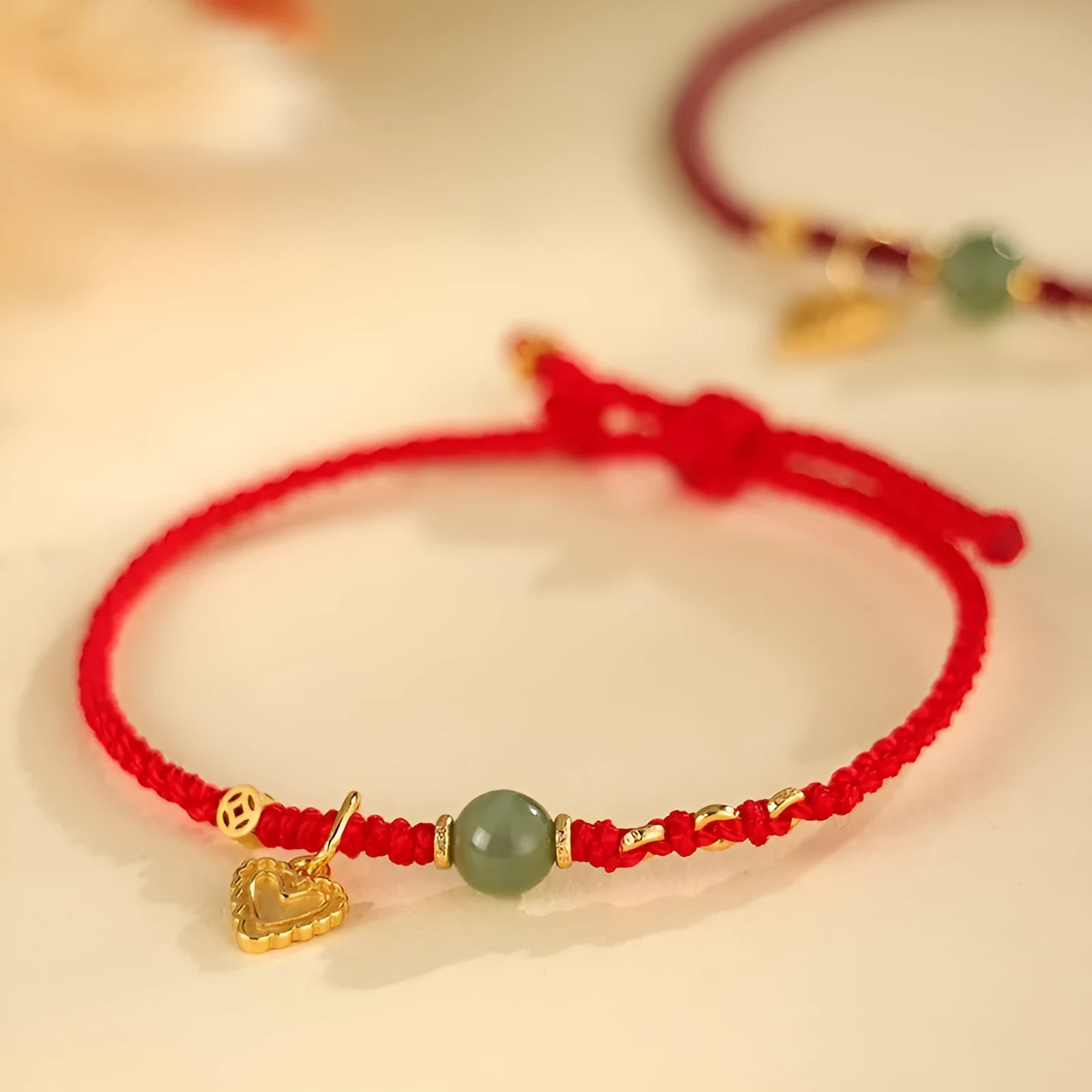 Handmade 925 silver and Hetian jade woven bracelet with red strap