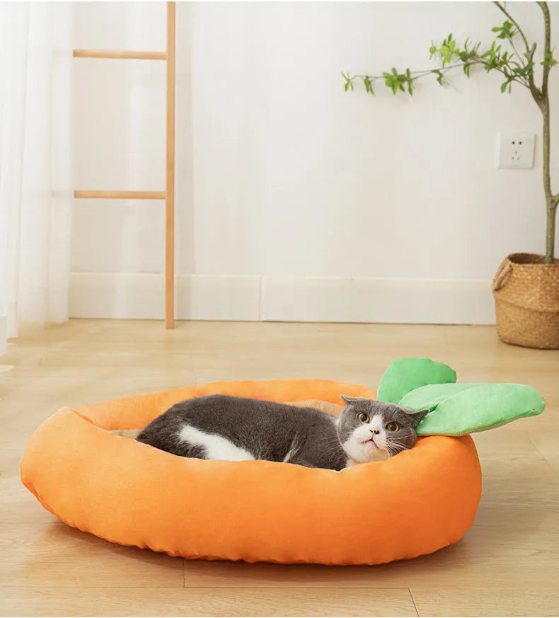 Carrot-shaped nesting dog bed with washable blanket for small or medium-sized pets