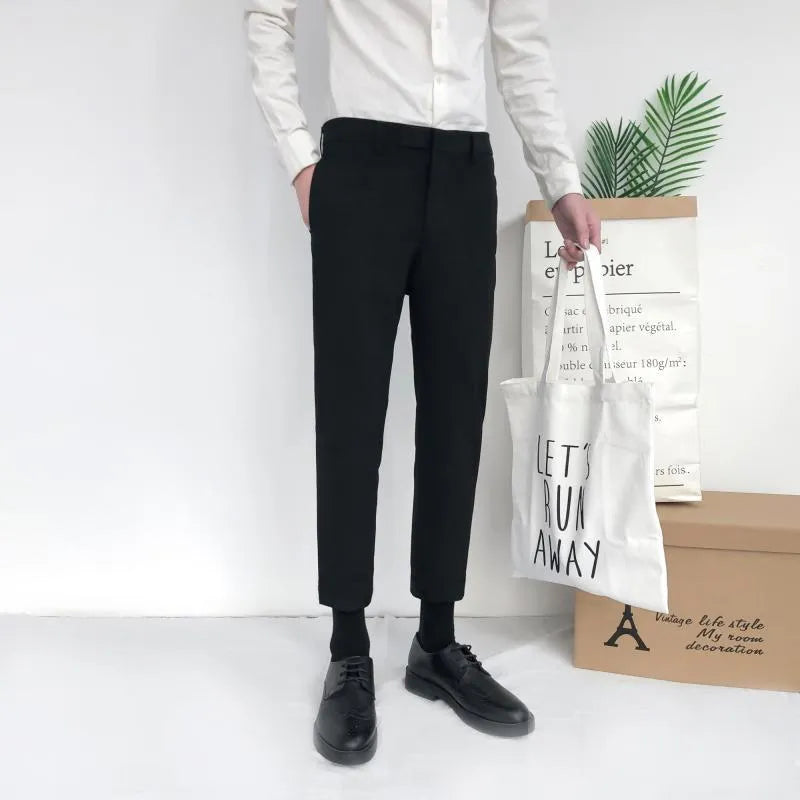 Men's straight-leg cotton trousers with drawstring waist in black, grey or khaki colours.