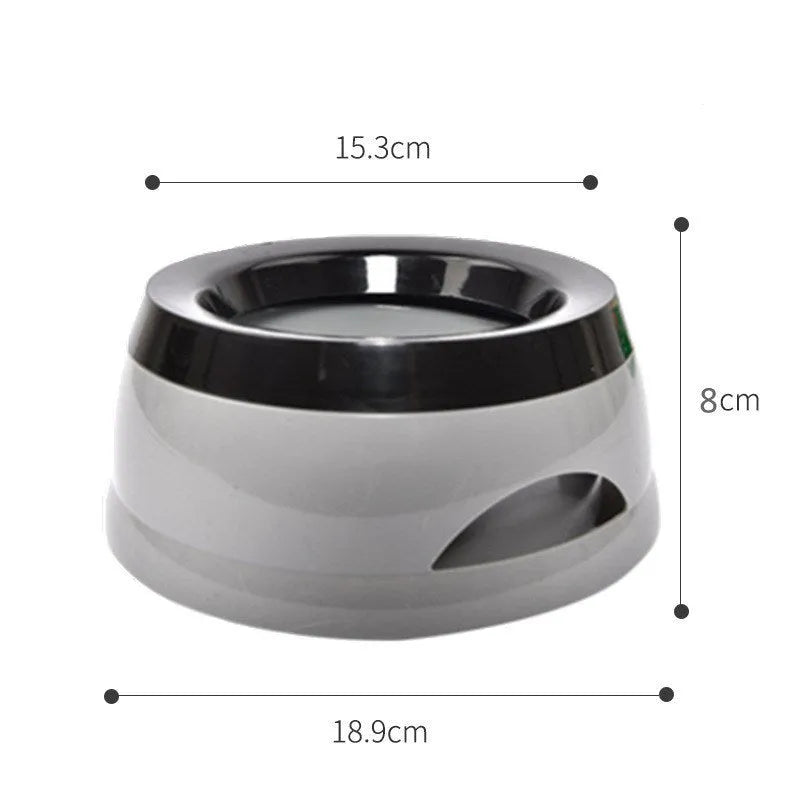 Grey pet drinking bowl with a floating ball on the water surface