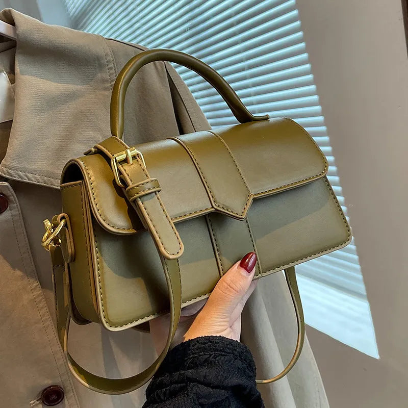 Women's beige messenger bag with 22cm width showing file compartment and exterior pocket
