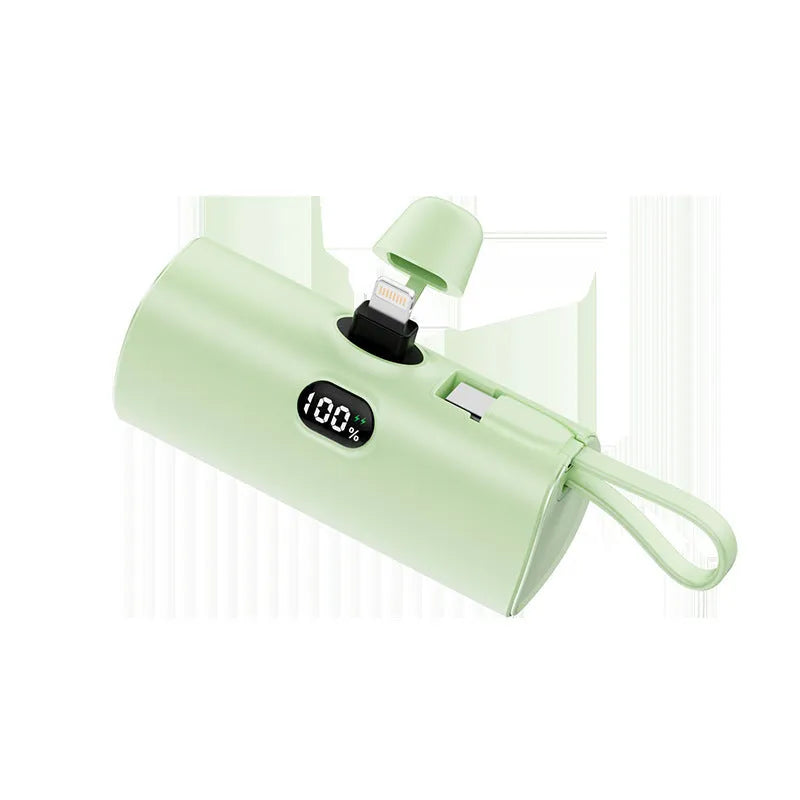 Capsule digital display wireless pocket power bank showing battery percentage on screen