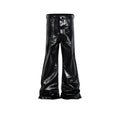 Black coated shiny patent leather skinny jeans with mid-waist straight-leg cut on a model