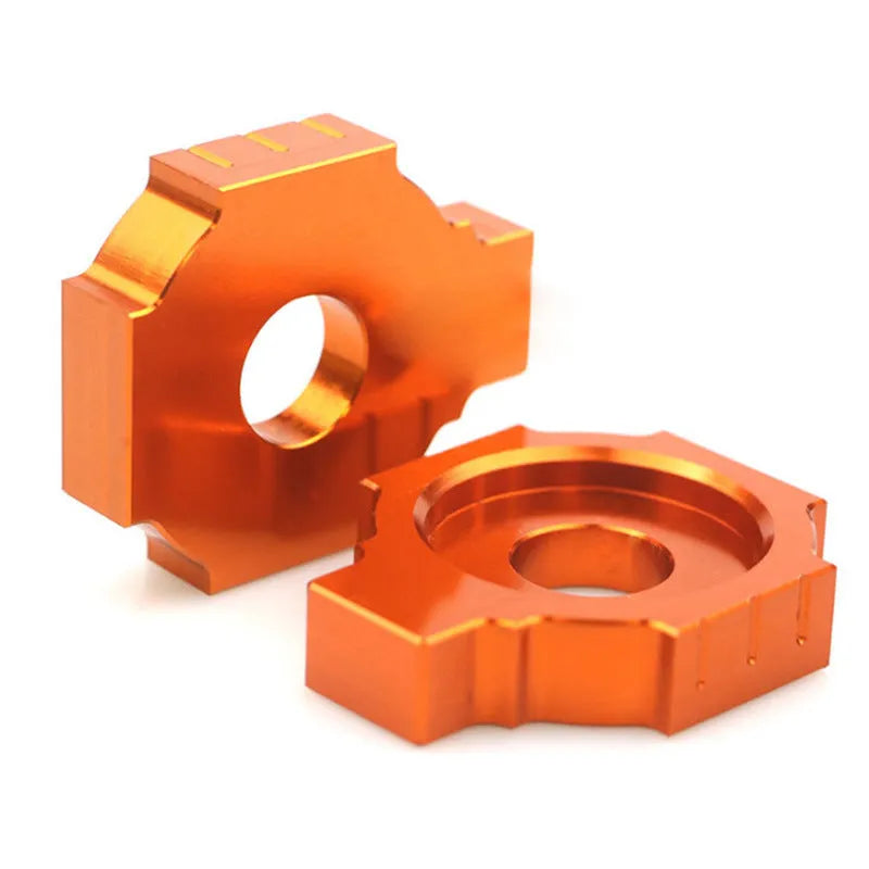 Pair of orange metal screw regulators for KTM DUKE motorcycle rear fork modification